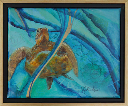 A framed acrylic painting of a sea turtle swimming underwater, featuring vibrant shades of blue, teal, and brown, enclosed in a light wood frame with a black inner border.