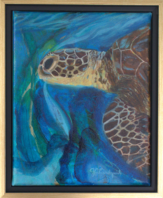 Framed acrylic painting of a sea turtle in blue ocean water, featuring a black and gold floating frame.