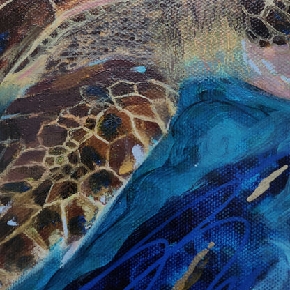 Close-up of an abstract painting featuring a textured sea turtle with brown and gold shell patterns and deep blue ocean waves.