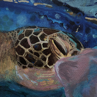 Close-up acrylic painting of a sea turtle head and shell in deep blue water, with textured brushstrokes and a soft pinkish foreground element.